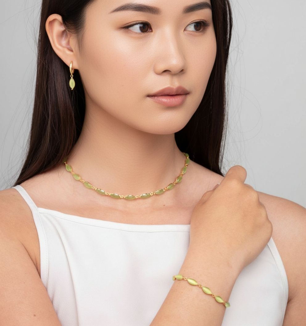 women_wearing_green_cats_eye_bracelet_necklace_and_earrings_semi_precious_stone_18k_gold_plated