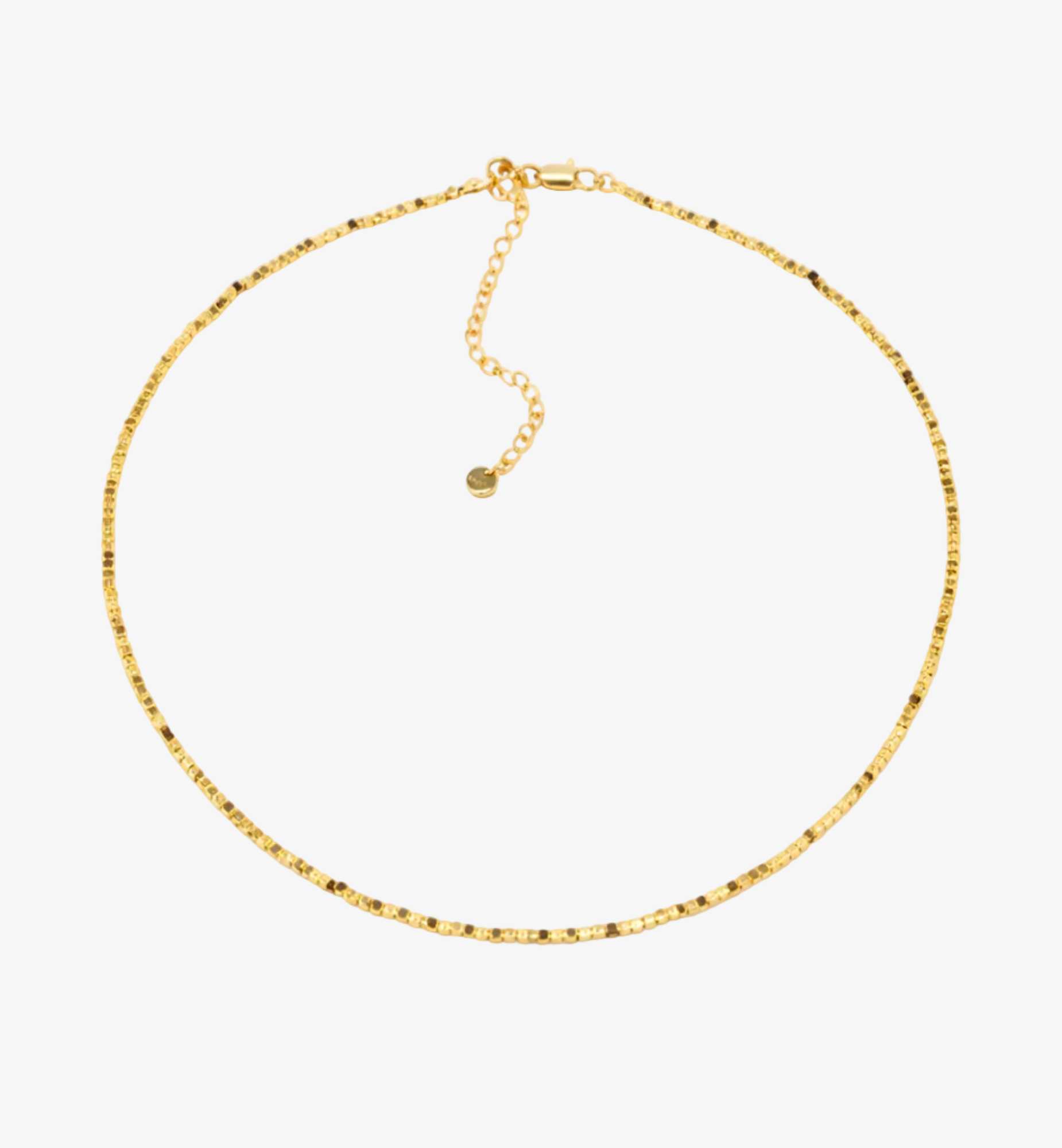 Gold necklace on a white background