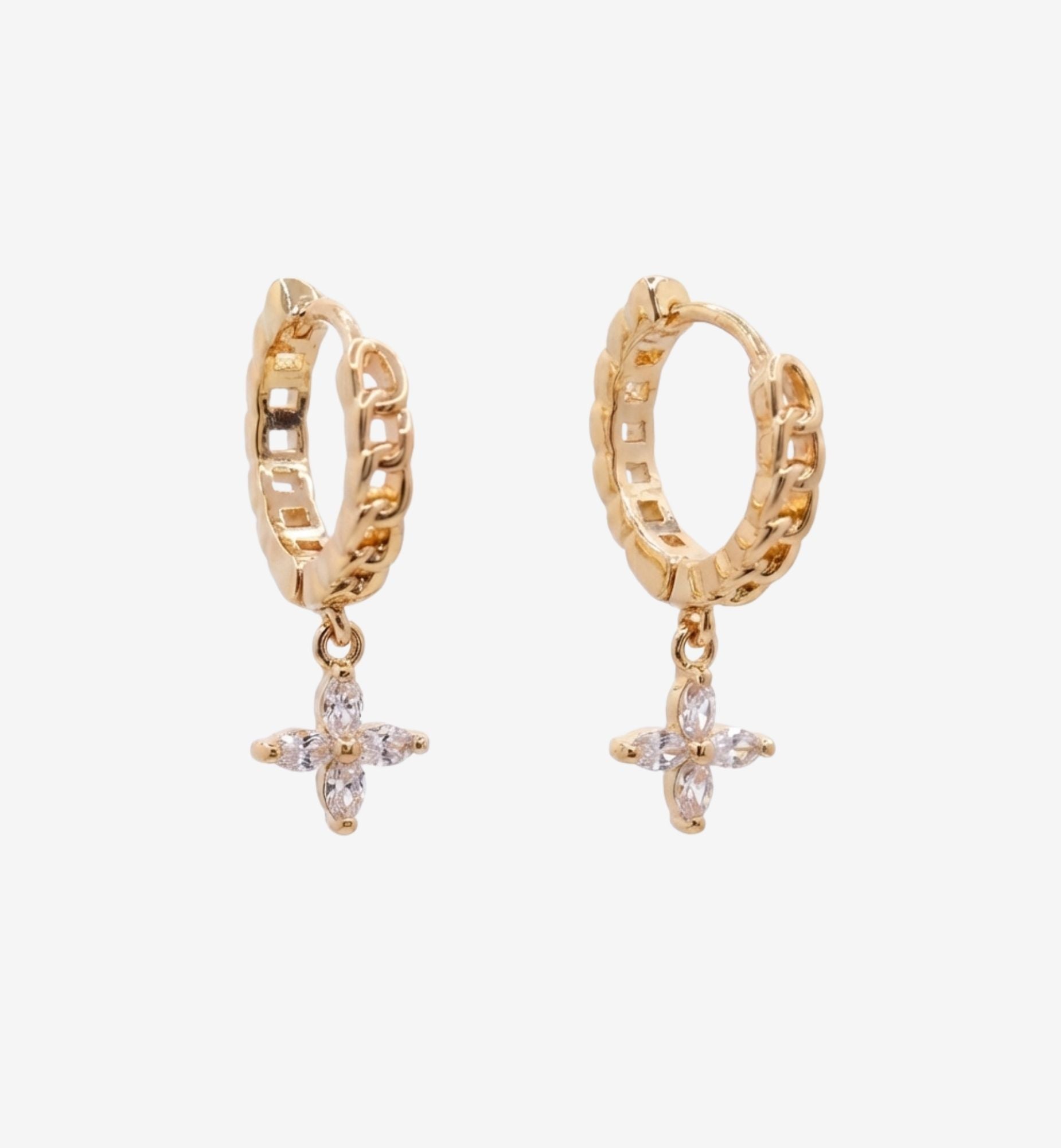 Gold hoop earrings with star-shaped charms on a white background