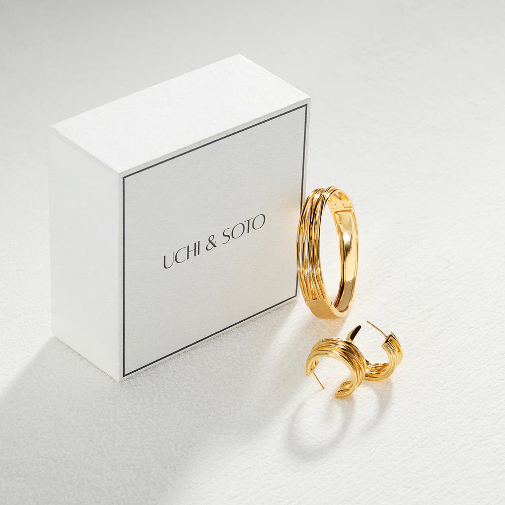 signature jewellery box uchi and soto with gold bangle and earrings