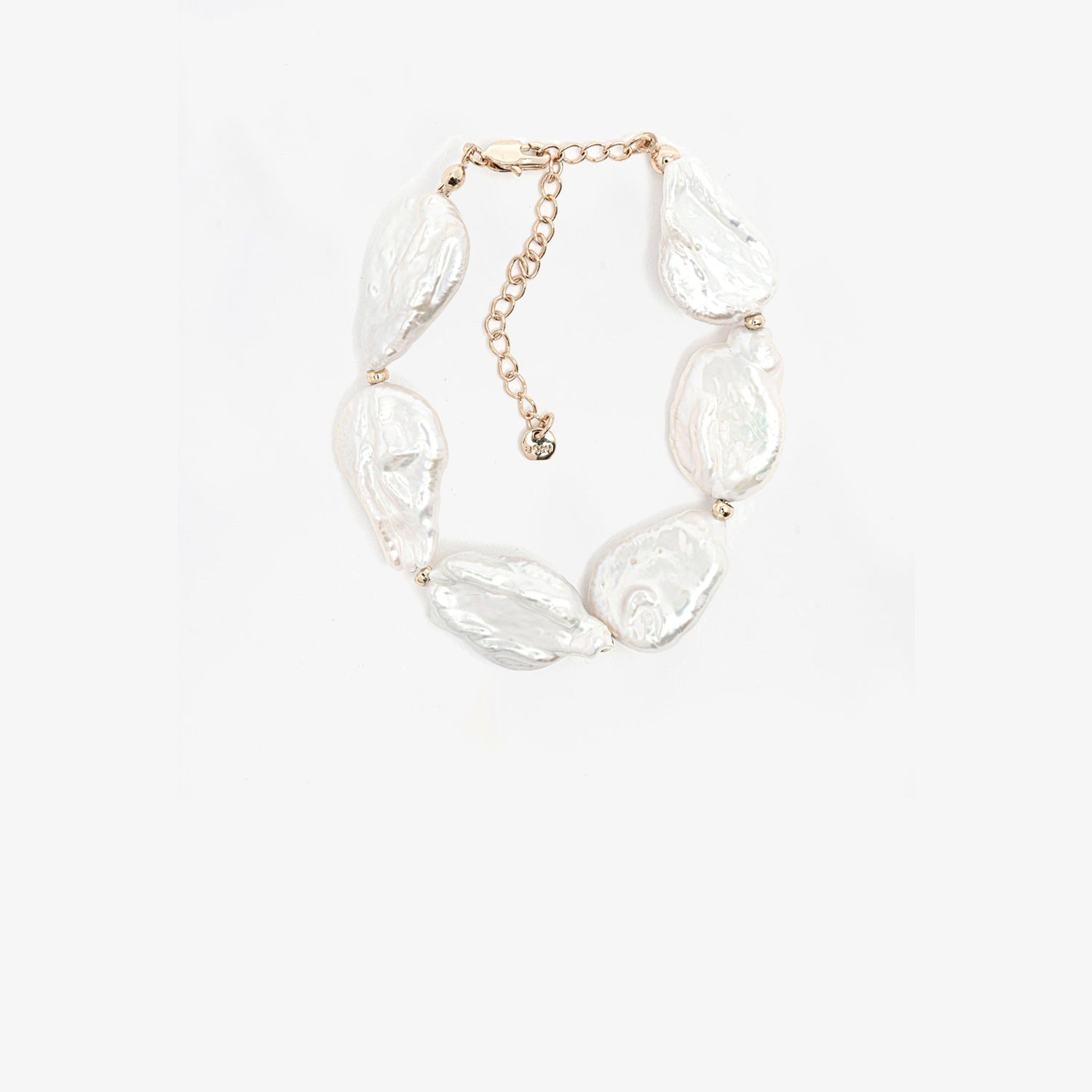 Necklace with clear teardrop-shaped beads on a light pink background