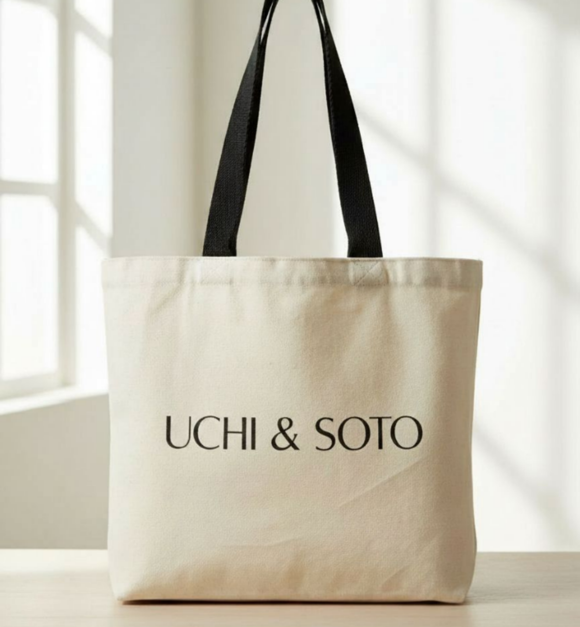uchisoto tote bag on table