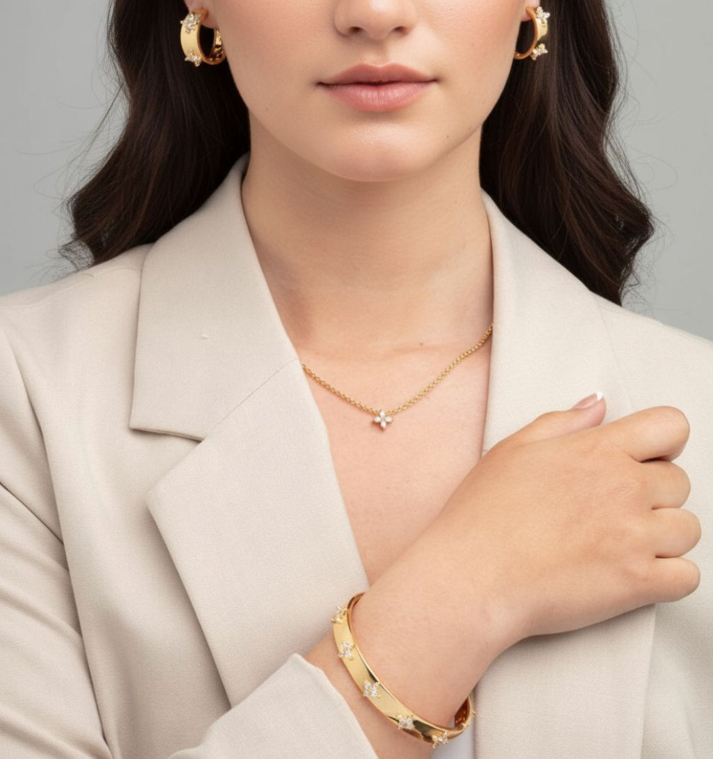 women_wearing_Gold_Bead_Floral_Bangle_18K_Gold_Plated_Cz_Rhinestones_and_floral_hoop_earrings