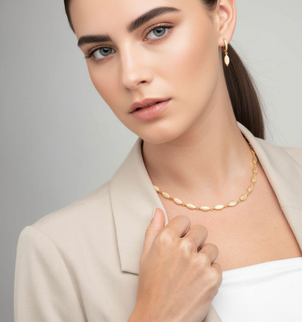 women wearing Nekomeishi_Cream_Cats_Eye_Necklace_18K_Gold_Plated_Jewellery_Necklace